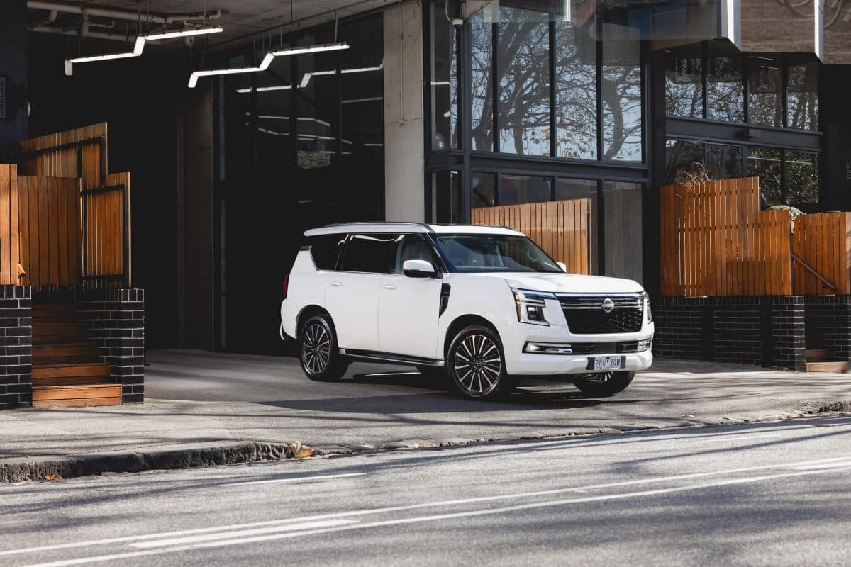 Buying Guide Nissan Patrol vs Toyota LandCruiser 300: which big 4WD wagon should you buy in 2026?, reviewed on CarTell.tv