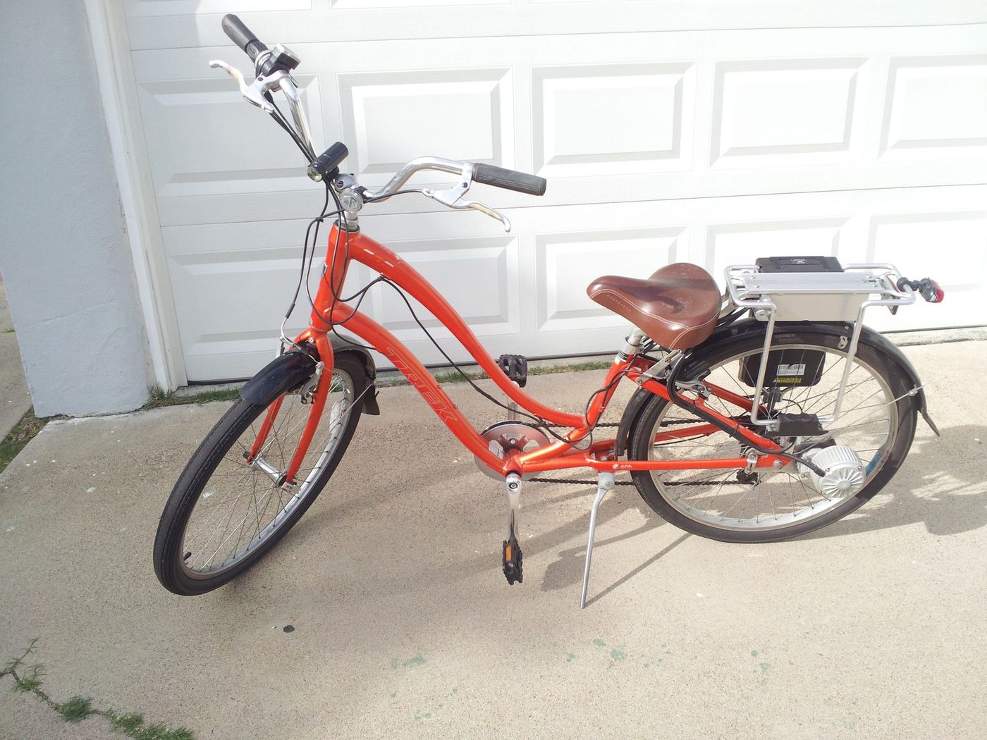 A bicycle fitted with an aftermarket electric conversion kit