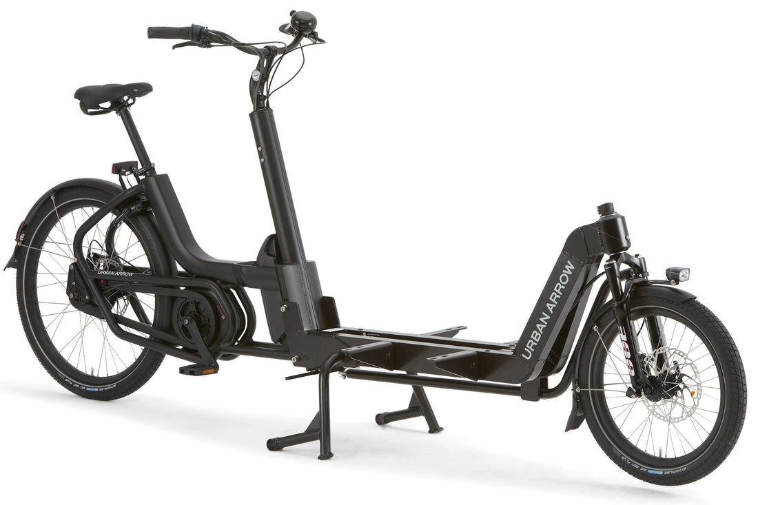 Urban Arrow Flatbed Cargo XL commercial e-cargo bike in black, side profile on white background